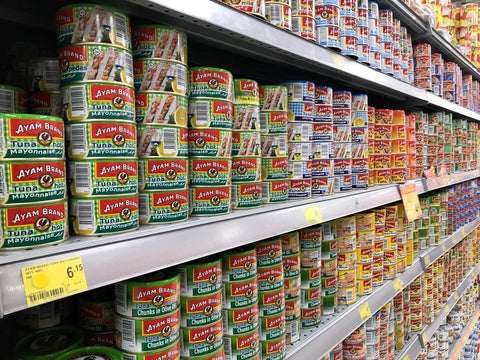 Cans of tuna in supermarket